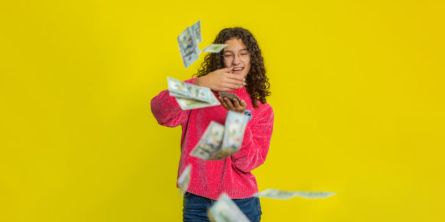 EXPANDED girl-wasting-throwing-sharing-money-dollar-cash-around-big-profit-winning-lottery-casino-jackpot